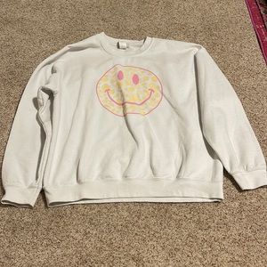 White Altard State smiley face crewneck with cheetah print. Size M